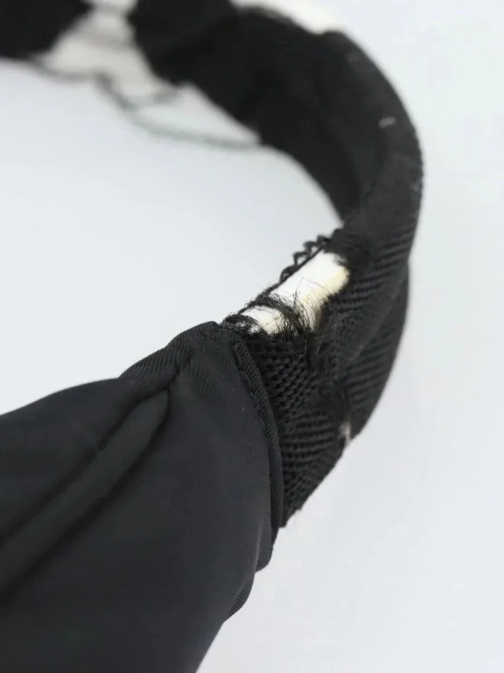 Prada brand	prada color	black